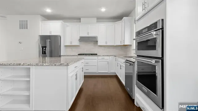 a view of livingroom with furniture wooden floor and window