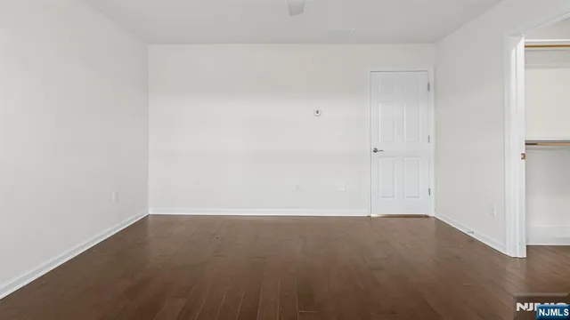 a bathroom with a sink toilet vanity and bathtub