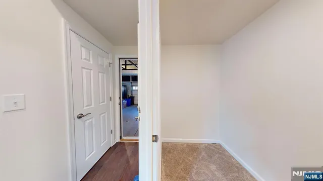 a bathroom with a sink a mirror and a toilet