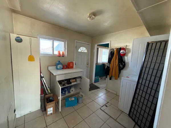 a room with furniture and a window