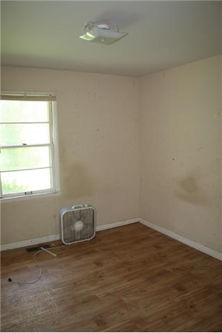 150 Driver Subdivision Prospect, TN 38477 - Photo 5 of 13 a view of wooden floor and cabinet in an empty room
