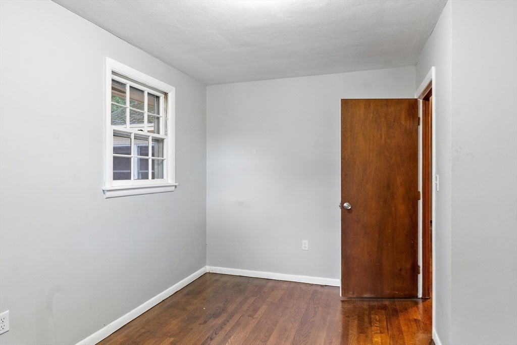 9 Nancy Drive Rutland, MA 01543 - Photo 12 of 19 a view of empty room with wooden floor and fan