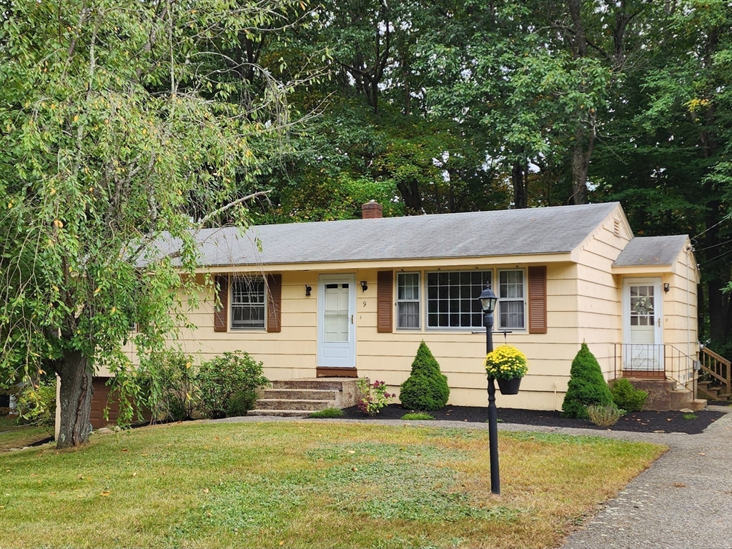 9 Nancy Drive Rutland, MA 01543 - Photo 19 of 19 a front view of house with yard and green space