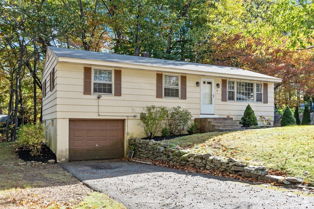 9 Nancy Drive Rutland, MA 01543 - Photo 3 of 19 a front view of a house with a yard