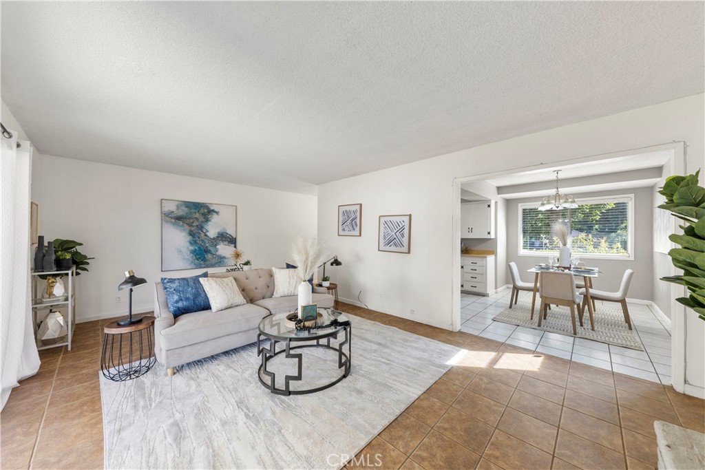 609 Elbrook Drive Fallbrook, CA 92028 - Photo 11 of 30 a living room with furniture and a table