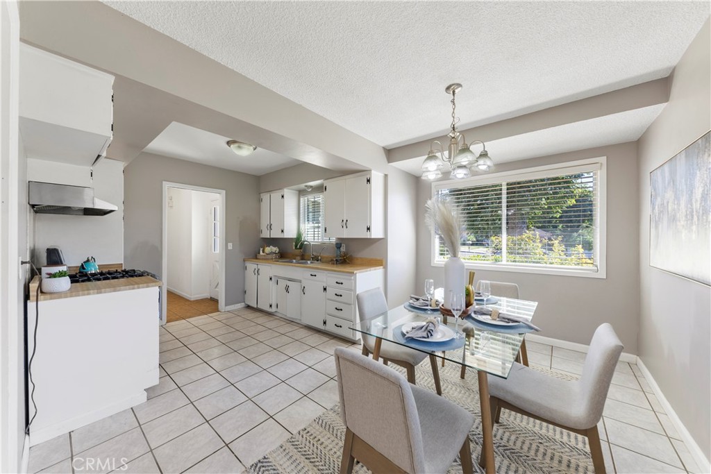 609 Elbrook Drive Fallbrook, CA 92028 - Photo 2 of 30 a kitchen with furniture and window