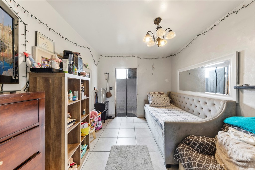 609 Elbrook Drive Fallbrook, CA 92028 - Photo 21 of 30 a very nice looking room with a large window and couch