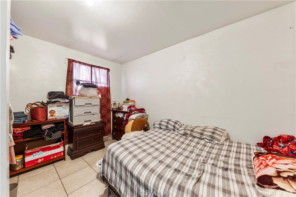 609 Elbrook Drive Fallbrook, CA 92028 - Photo 23 of 30 a bedroom with a bed and a closet