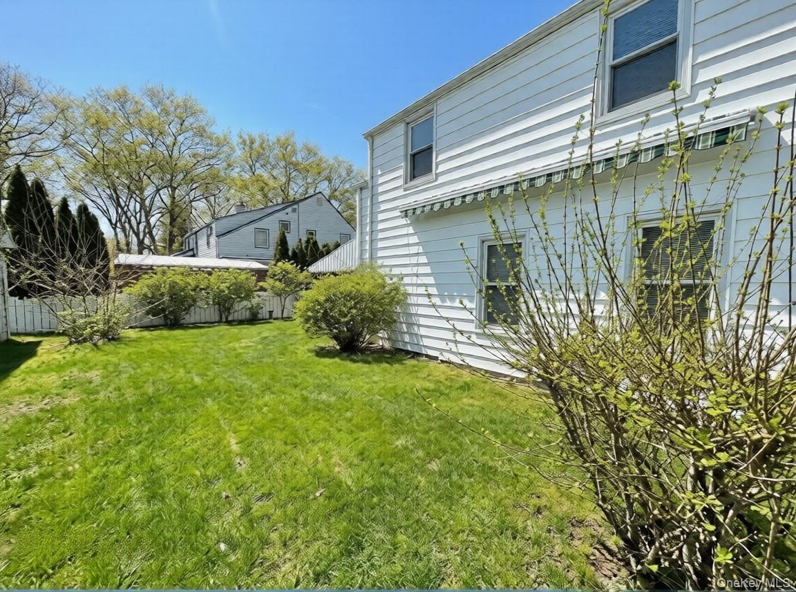 67 Elton Road Garden City, NY 11530 - Photo 2 of 11 house side (staged)