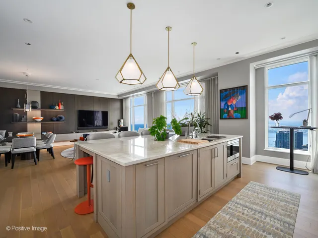 a view of living room and kitchen