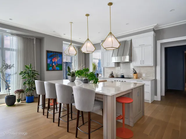 a view of a dining room and furniture window and wooden floor