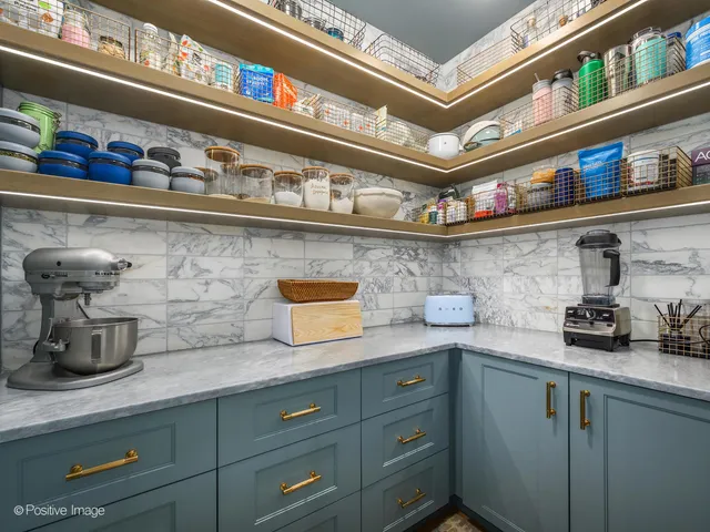 a kitchen with a cabinets and a stove