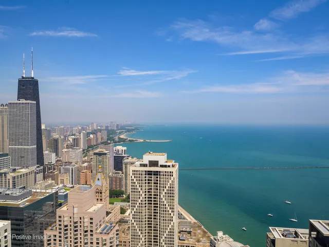 a view of city with ocean