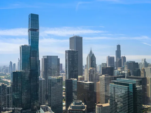 a view of a city with tall buildings