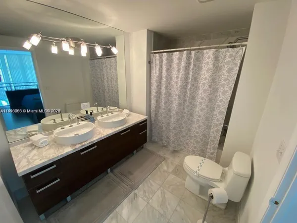a view of a closet in kitchen