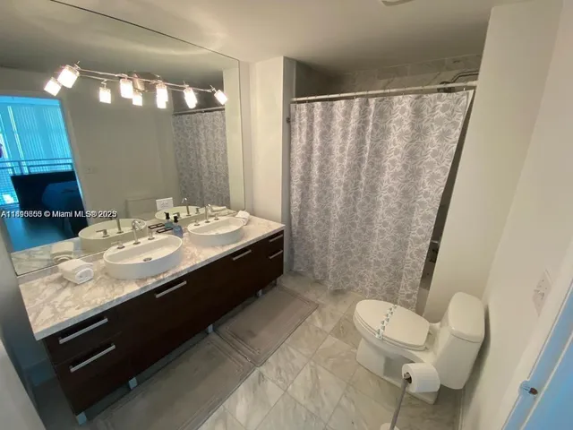 a view of a closet in kitchen