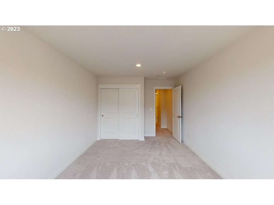 12915 Southwest Tabor Terrace Beaverton, OR 97007 - Photo 10 of 11 a open hall with a outdoor space