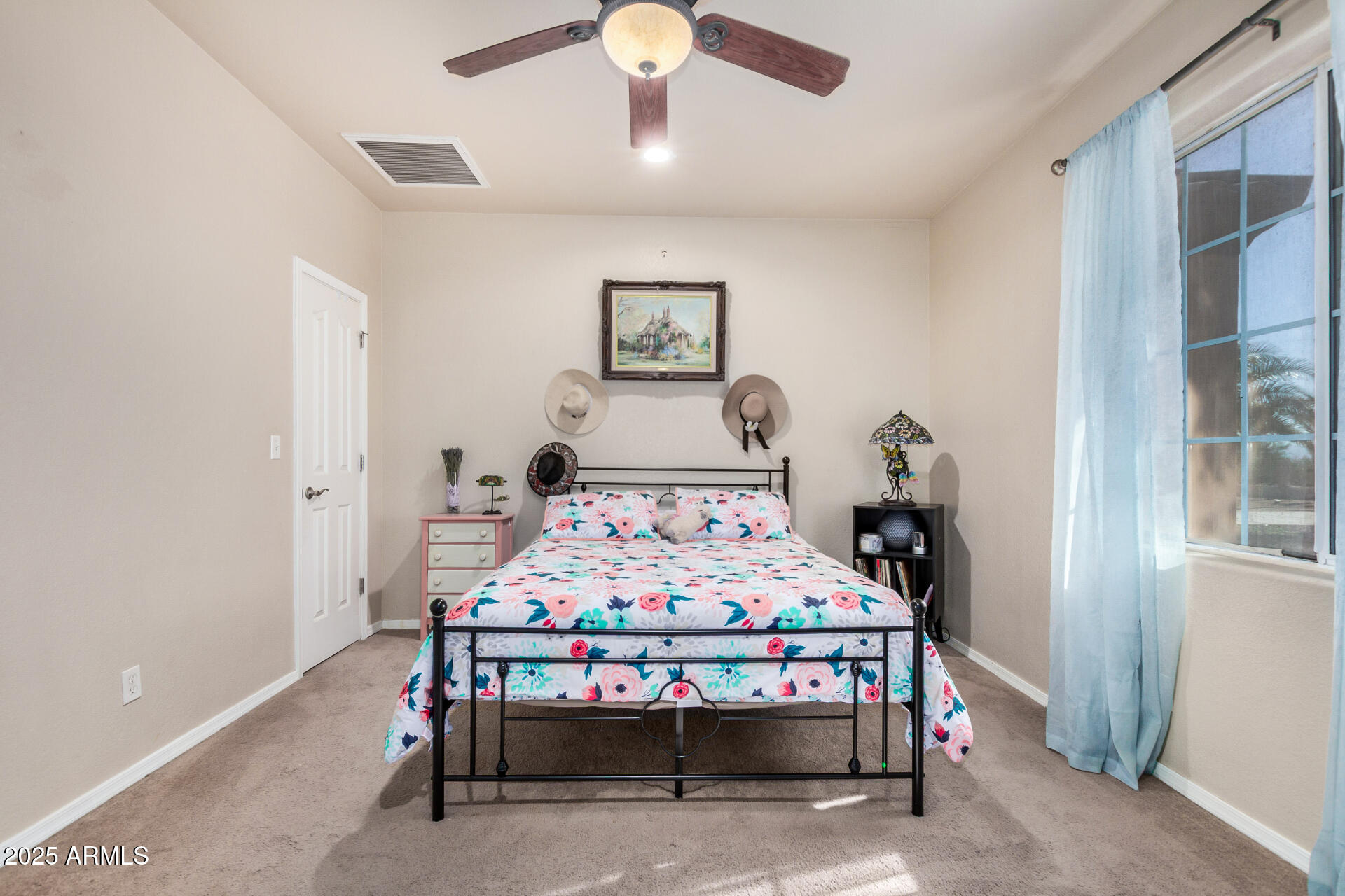 11381 Warrior Road Casa Grande, AZ 85193 - Photo 17 of 73 a bedroom with a bed and a table in it