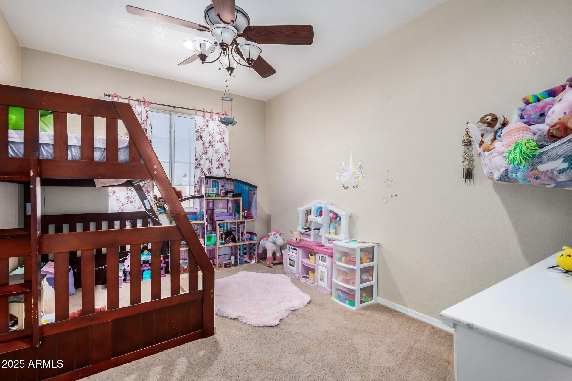 11381 Warrior Road Casa Grande, AZ 85193 - Photo 21 of 73 a bedroom with furniture a rug and a book shelf