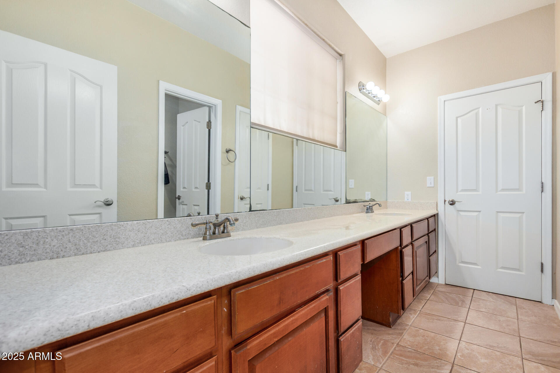 11381 Warrior Road Casa Grande, AZ 85193 - Photo 25 of 73 a bathroom with a sink and a mirror