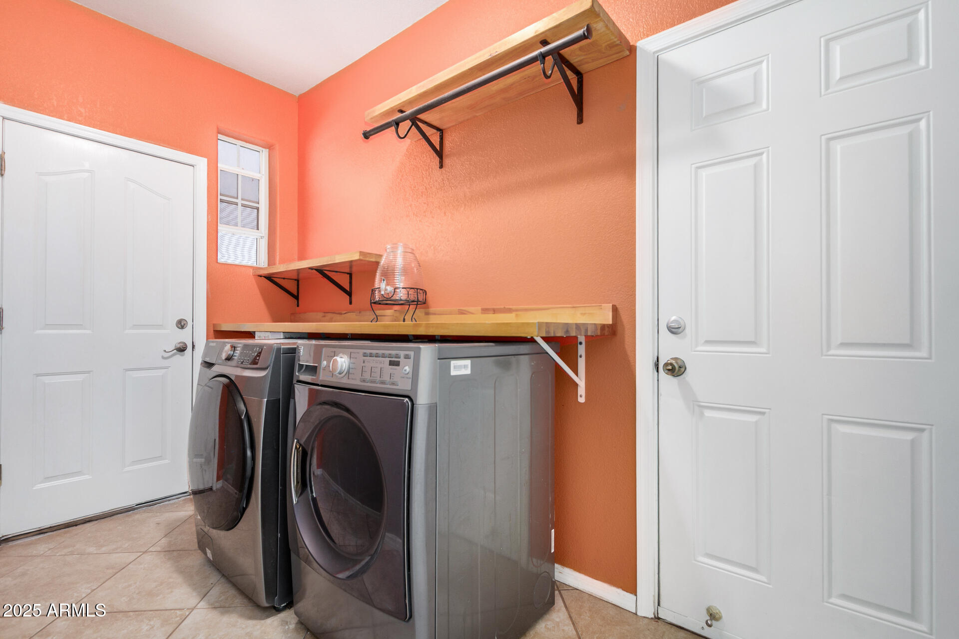 11381 Warrior Road Casa Grande, AZ 85193 - Photo 32 of 73 a utility room with dryer and washer