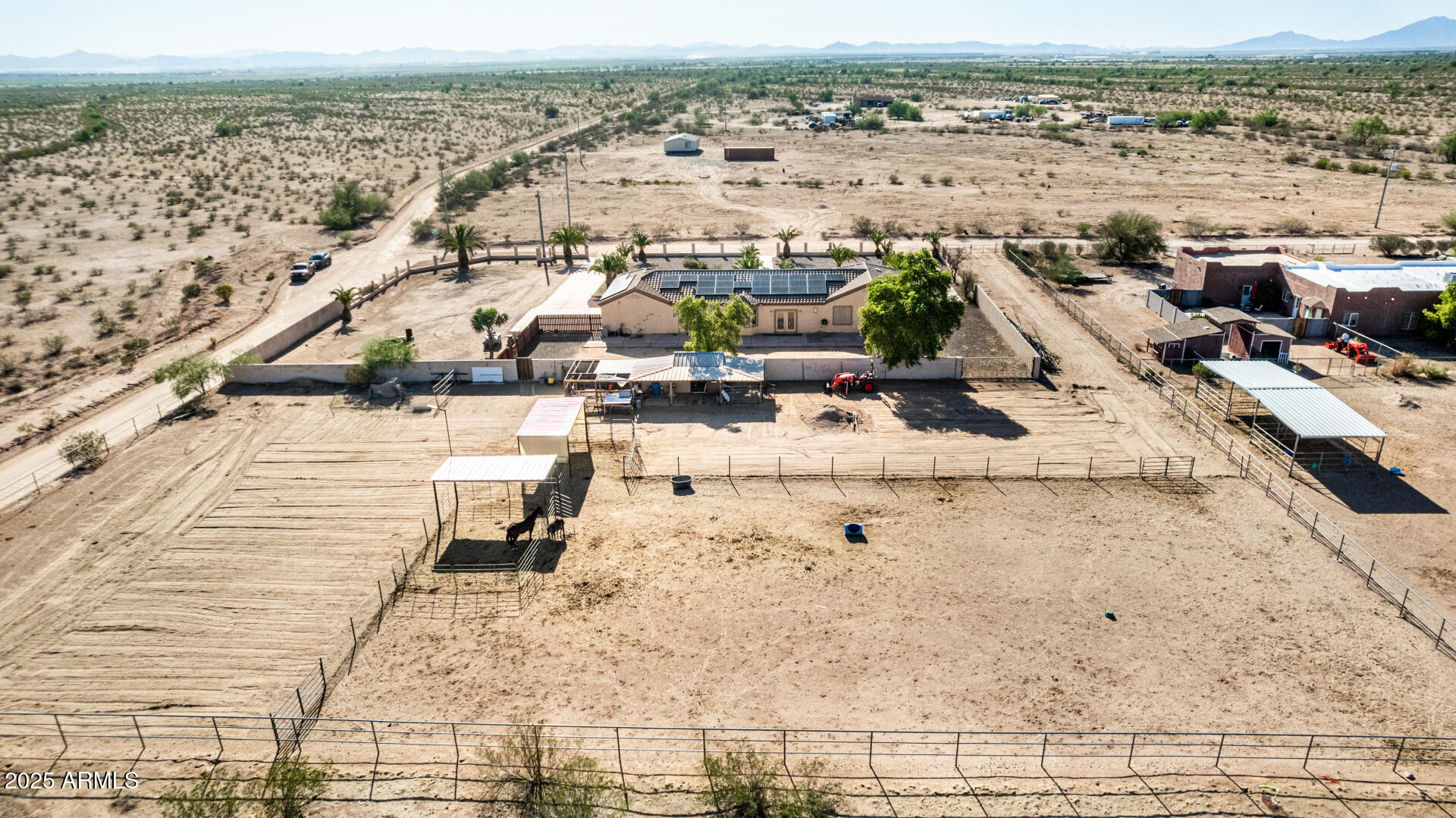 11381 Warrior Road Casa Grande, AZ 85193 - Photo 38 of 73 an aerial view of residential houses with outdoor space