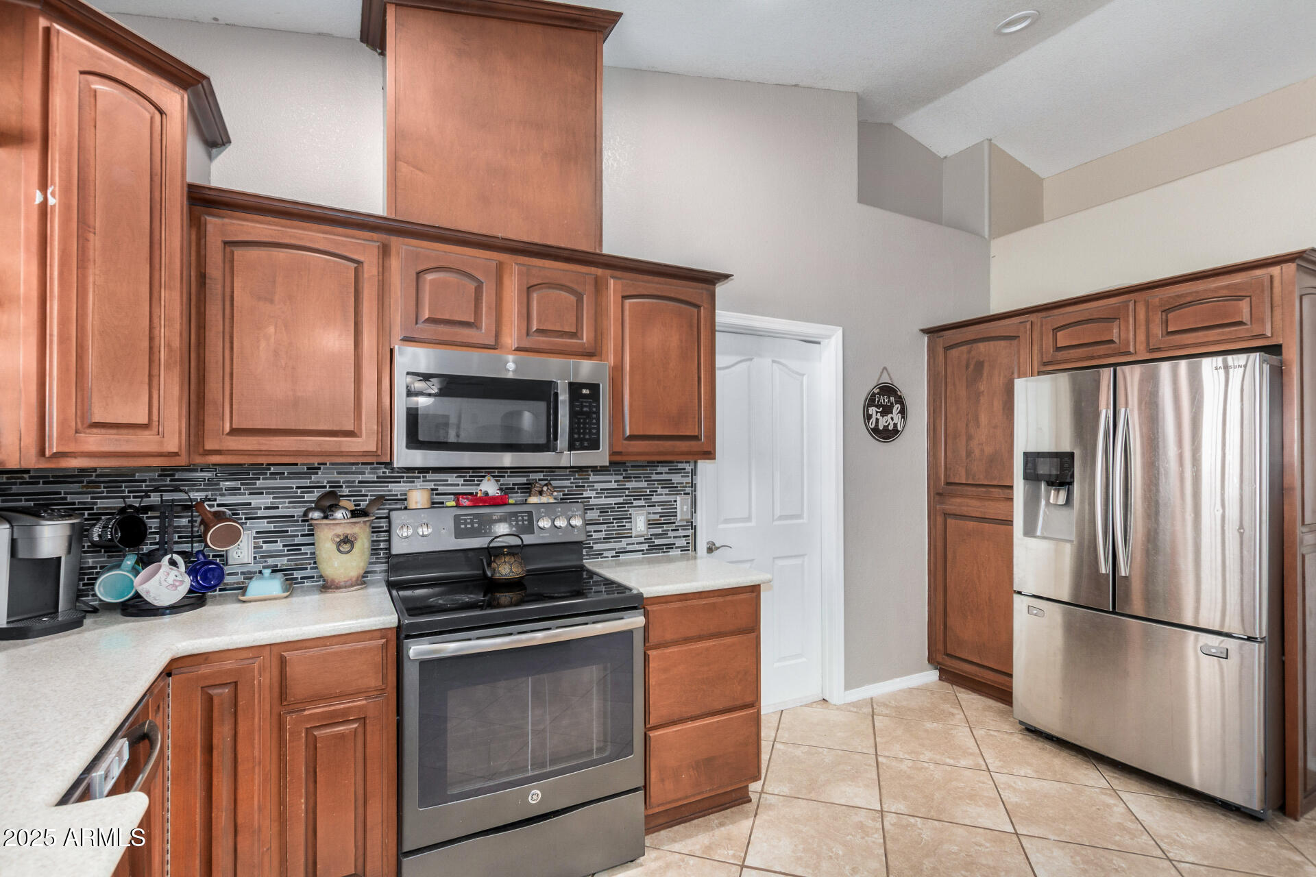 11381 Warrior Road Casa Grande, AZ 85193 - Photo 8 of 73 a kitchen with stainless steel appliances granite countertop a refrigerator stove and sink