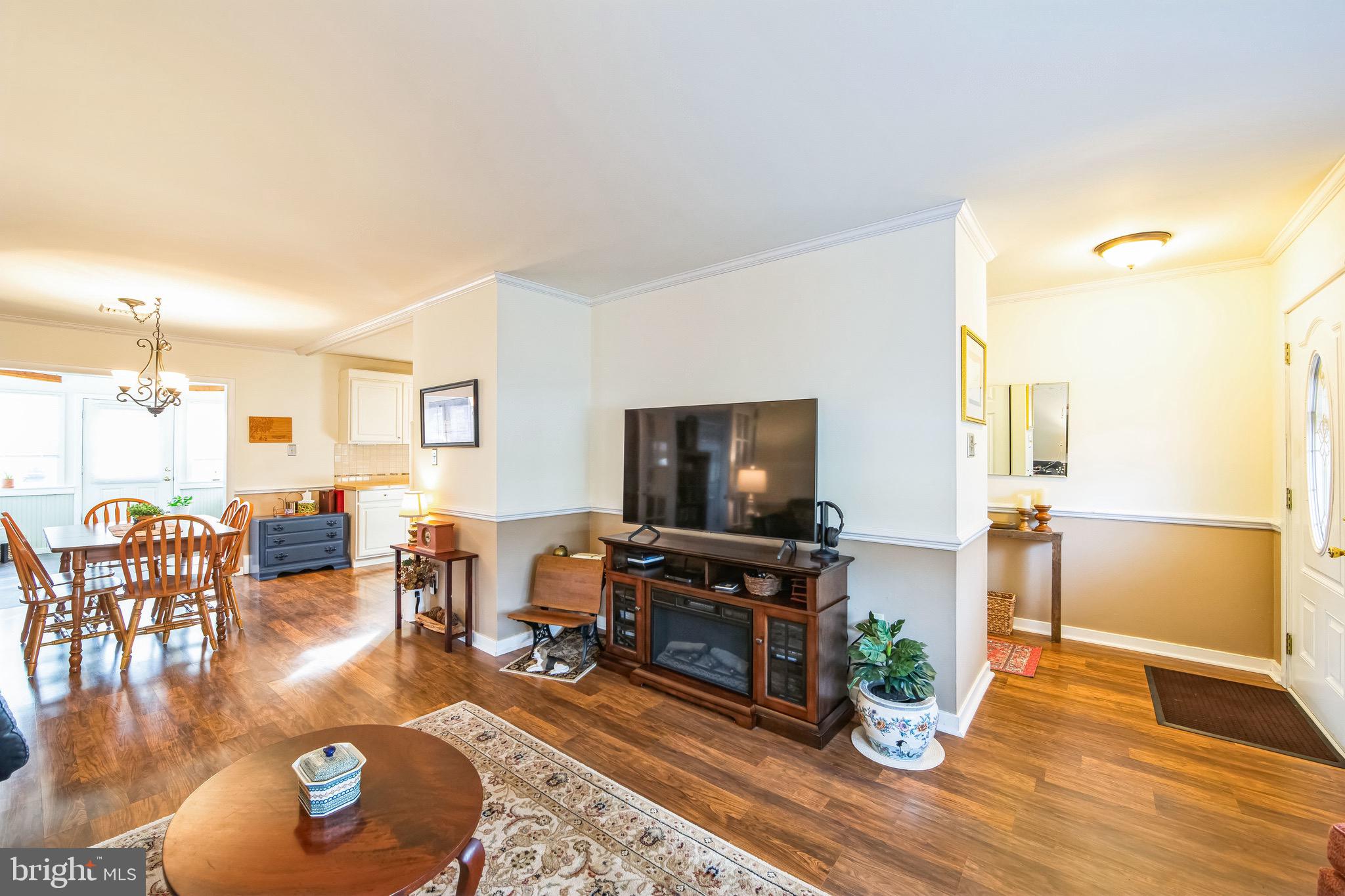 124 Locust Lane Exton, PA 19341 - Photo 11 of 30 Living Room looking into kitchen & sunroom