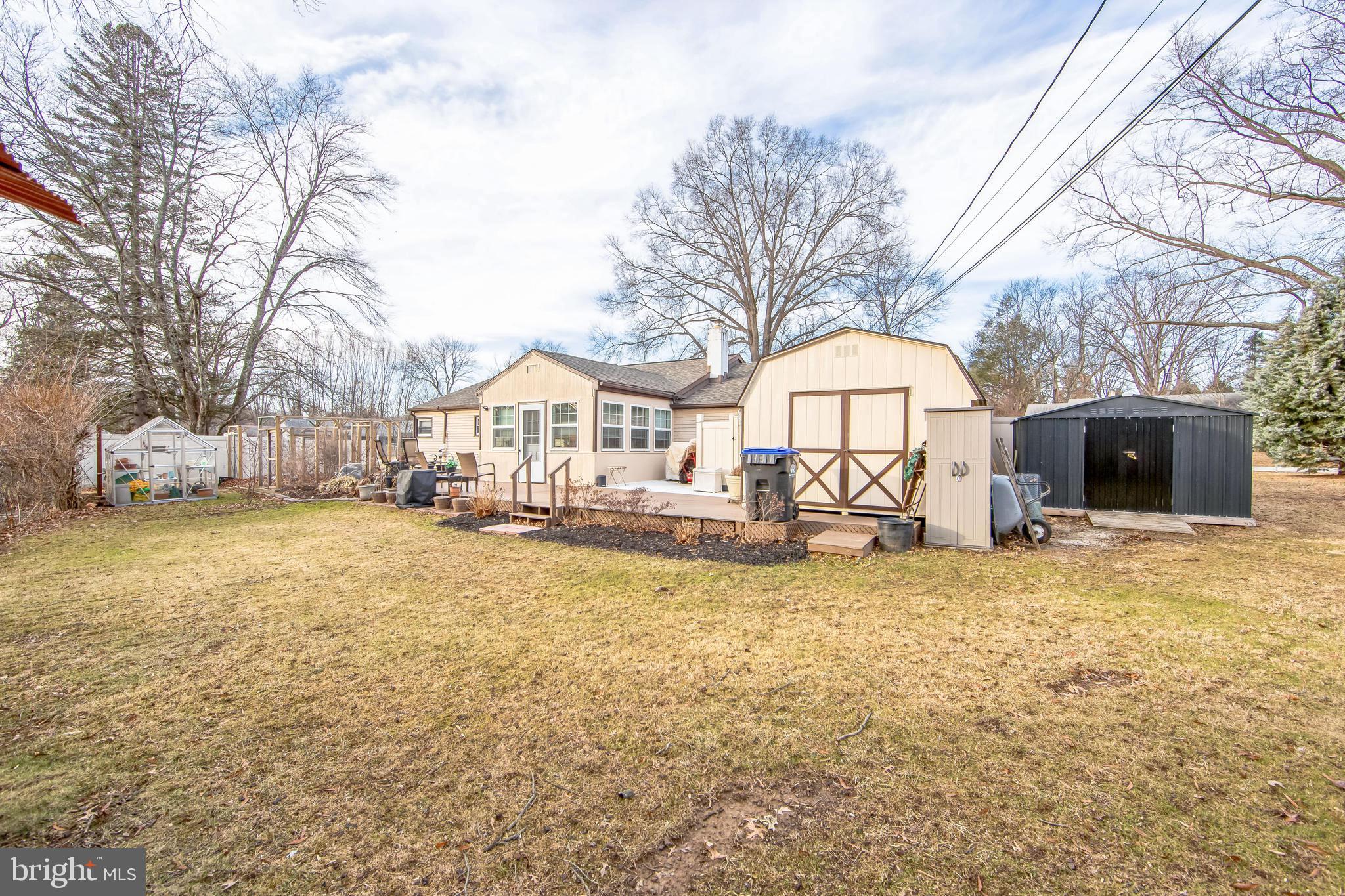 124 Locust Lane Exton, PA 19341 - Photo 26 of 30 Rear view of home & sheds