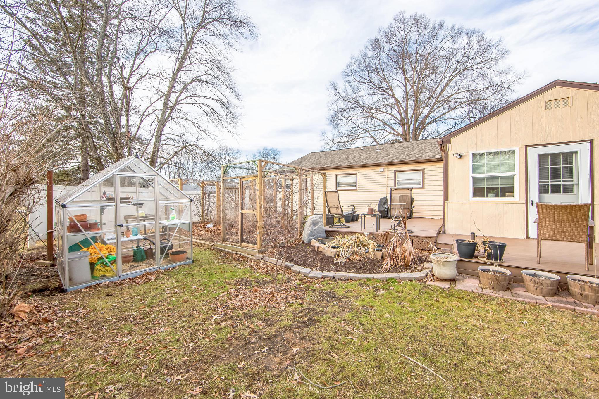 124 Locust Lane Exton, PA 19341 - Photo 27 of 30 Pond & caged garden area