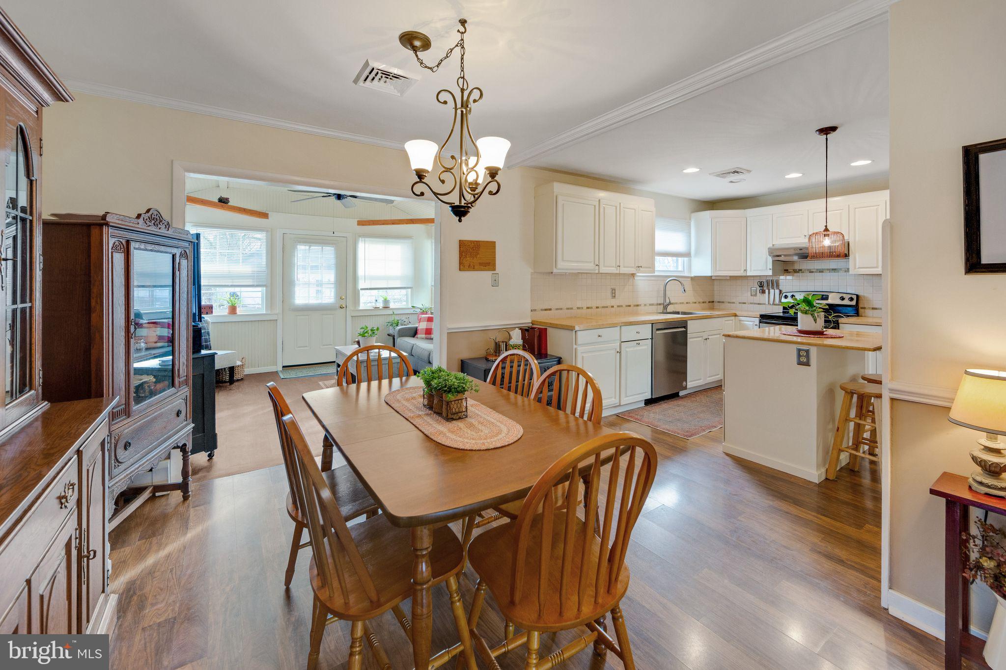 124 Locust Lane Exton, PA 19341 - Photo 8 of 30 Dining Room with view into the sunroom