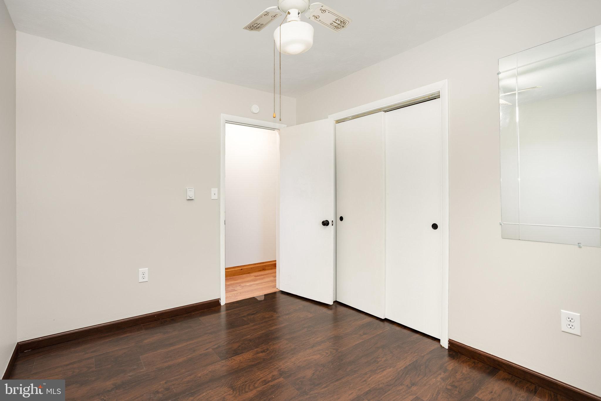 1081 Beaver Creek Road Hanover, PA 17331 - Photo 21 of 33 a view of an empty room with wooden floor