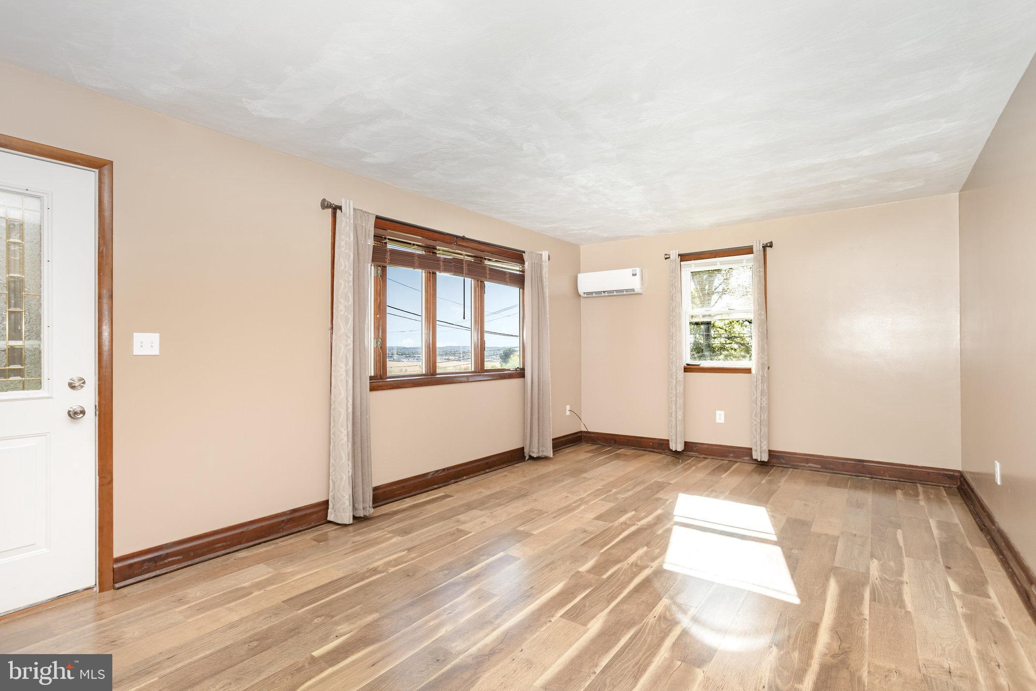 1081 Beaver Creek Road Hanover, PA 17331 - Photo 6 of 33 an empty room with windows and closet