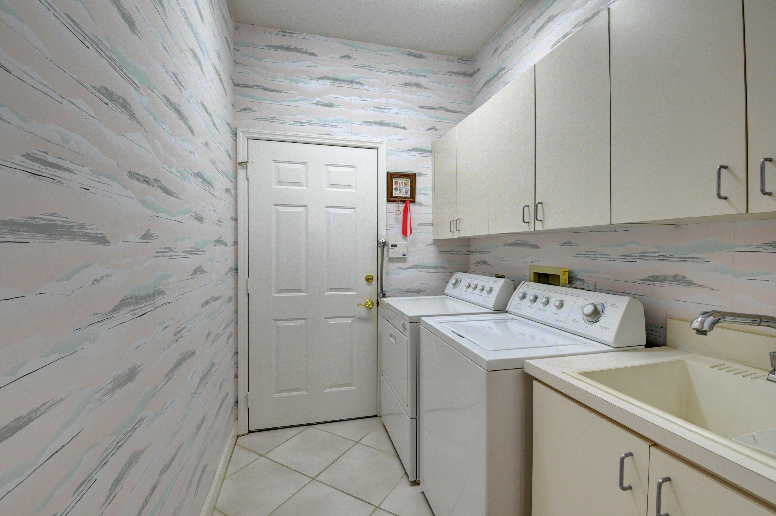 10494 Stonebridge Boulevard Boca Raton, FL 33498 - Photo 26 of 43 LAUNDRY ROOM