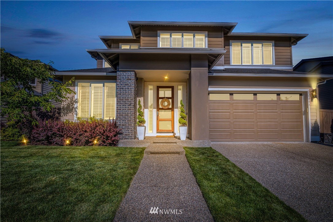 16929 40th Drive Southeast Bothell, WA 98012 - Photo 1 of 1 a front view of a house with a yard