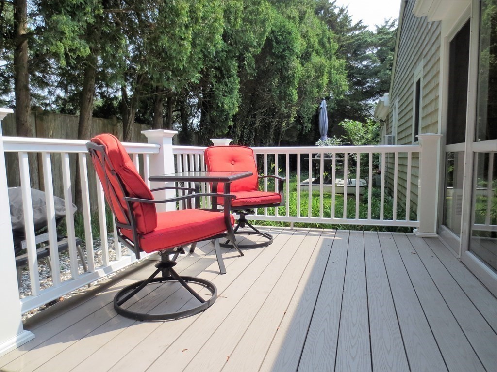 558 Craigville Beach Road Barnstable, MA 02632 - Photo 8 of 35 a view of a chairs on the roof deck