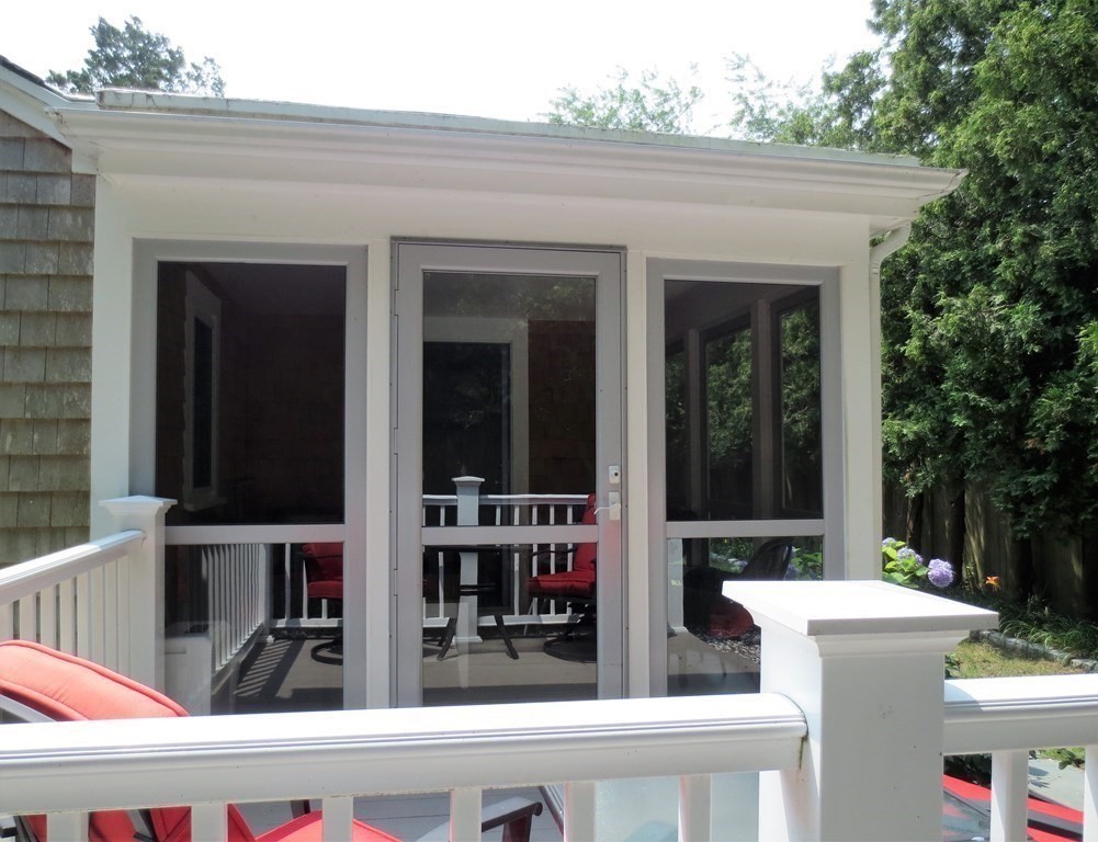 558 Craigville Beach Road Barnstable, MA 02632 - Photo 10 of 35 front view of house with a potted plant