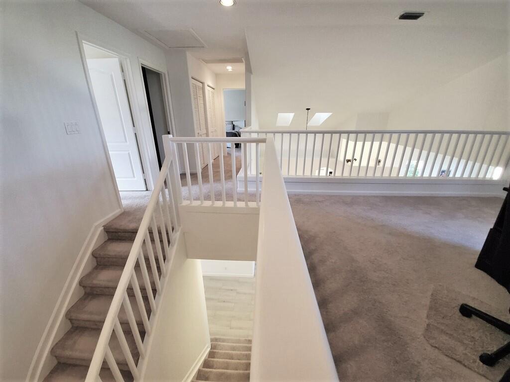 46 Pinnacle Cove Palm Beach Gardens, FL 33418 - Photo 20 of 20 a view of entryway with wooden floor
