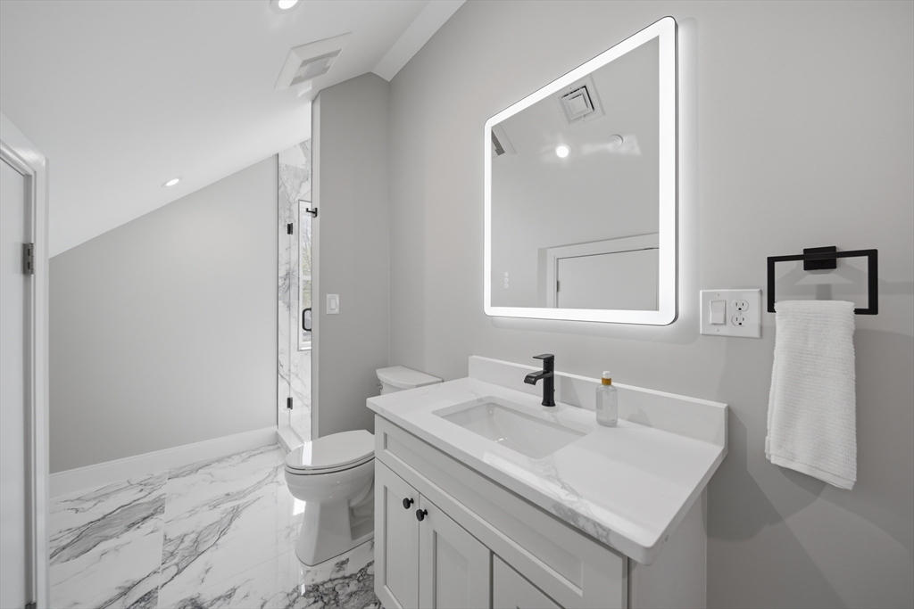 174 Walnut Street, Unit 3 Somerville, MA 02145 - Photo 14 of 38 a bathroom with a sink toilet and shower