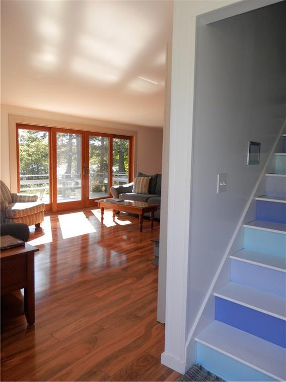 226 Atlantic Quarry Road Spruce Head, ME 04859 - Photo 15 of 35 Stairwell and Living Room