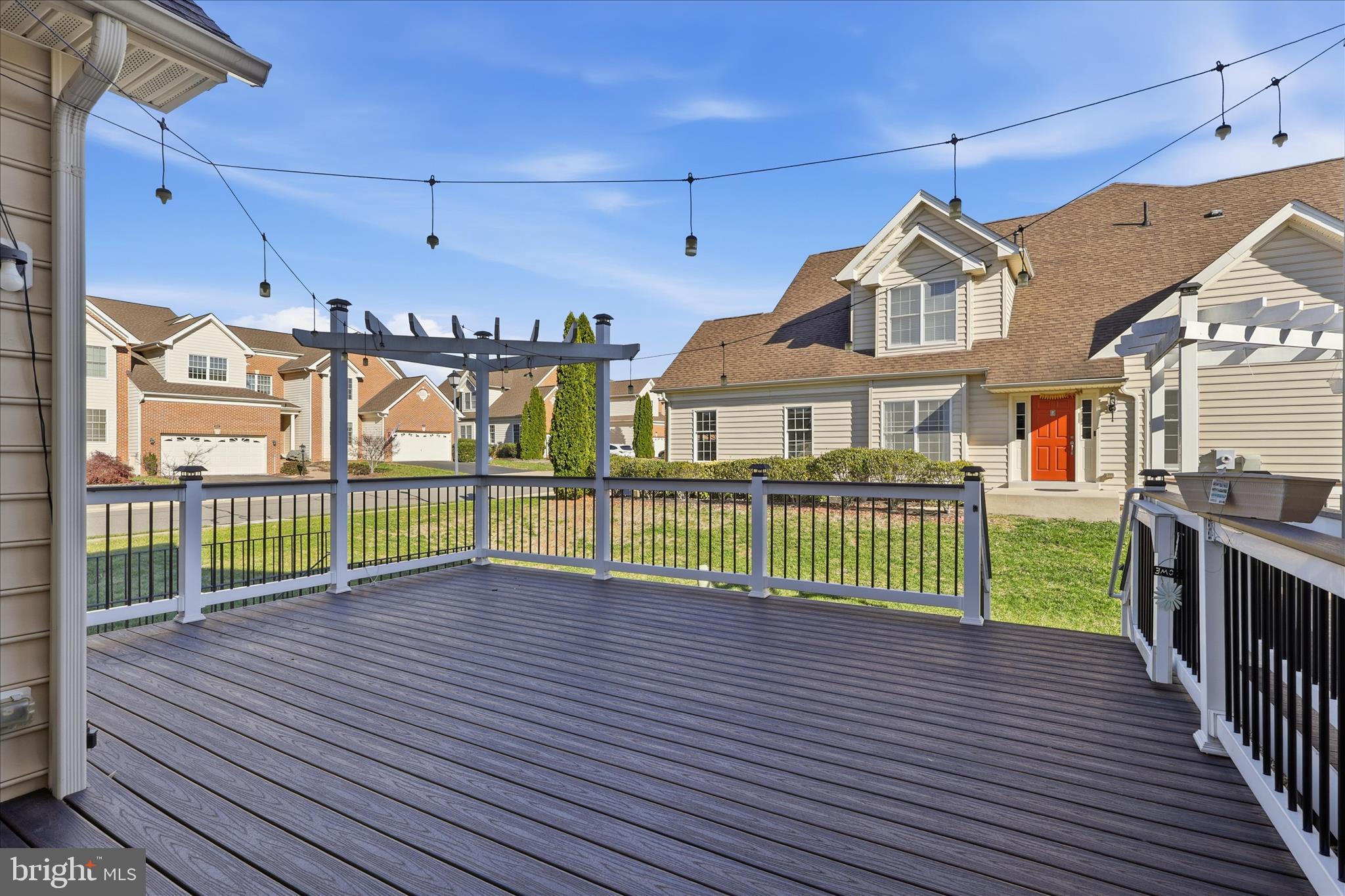 22908 North Brown Square Ashburn, VA 20148 - Photo 28 of 57 a view of a house with a street view and a porch