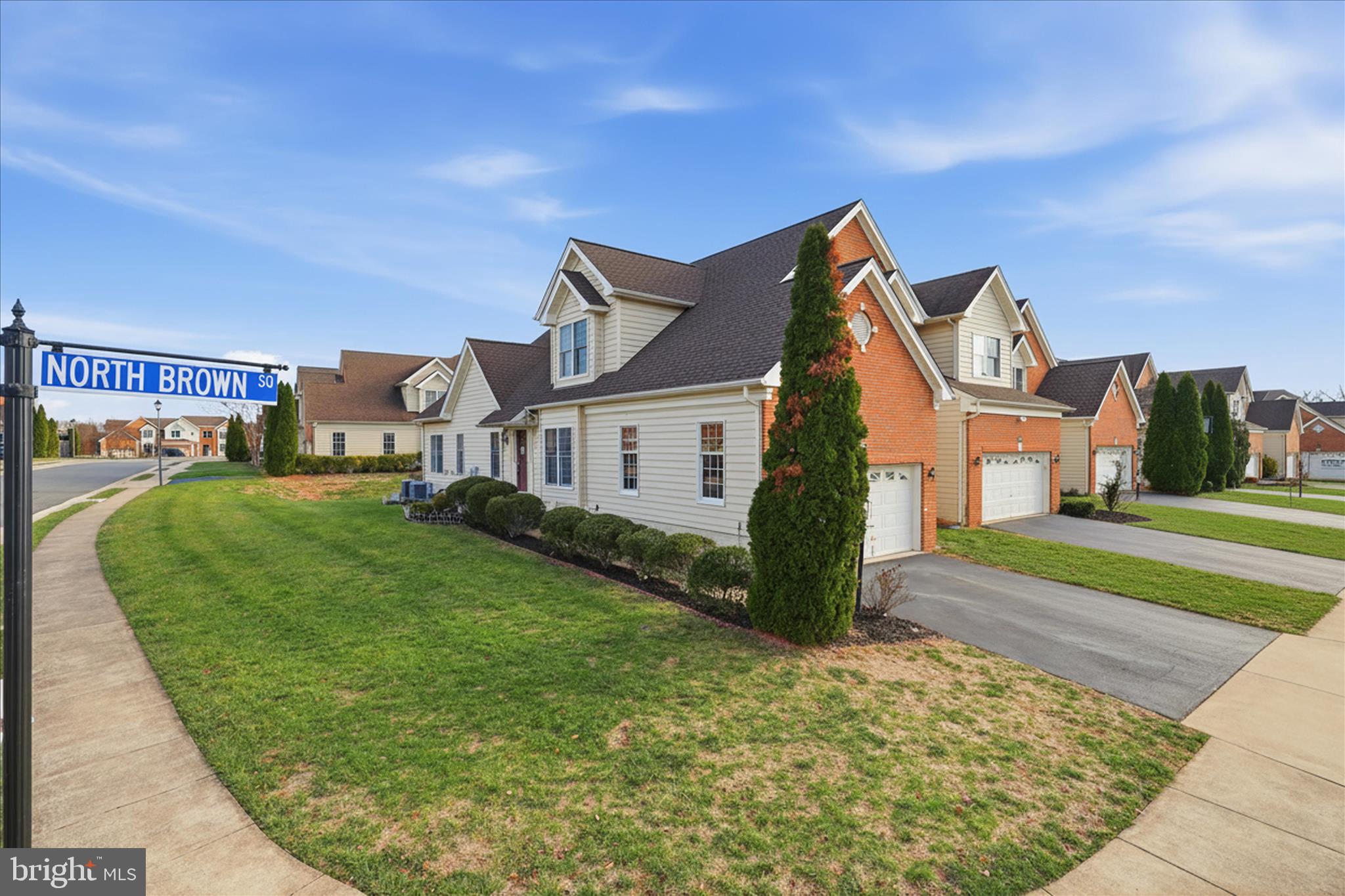22908 North Brown Square Ashburn, VA 20148 - Photo 3 of 57 a view of a house with a big yard plants and large trees