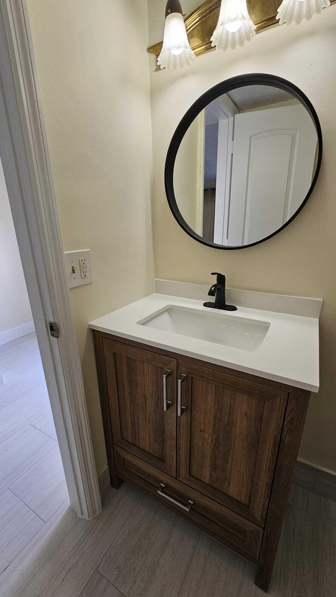 8801 West Sample Road, Unit 11 Coral Springs, FL 33065 - Photo 8 of 25 HALF BATH_2_8801 SAMPLE RD