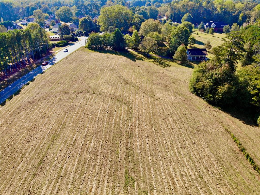 0 Corner Road Powder Springs, GA 30127 - Photo 6 of 36 a bunch of flowers sitting in a yard