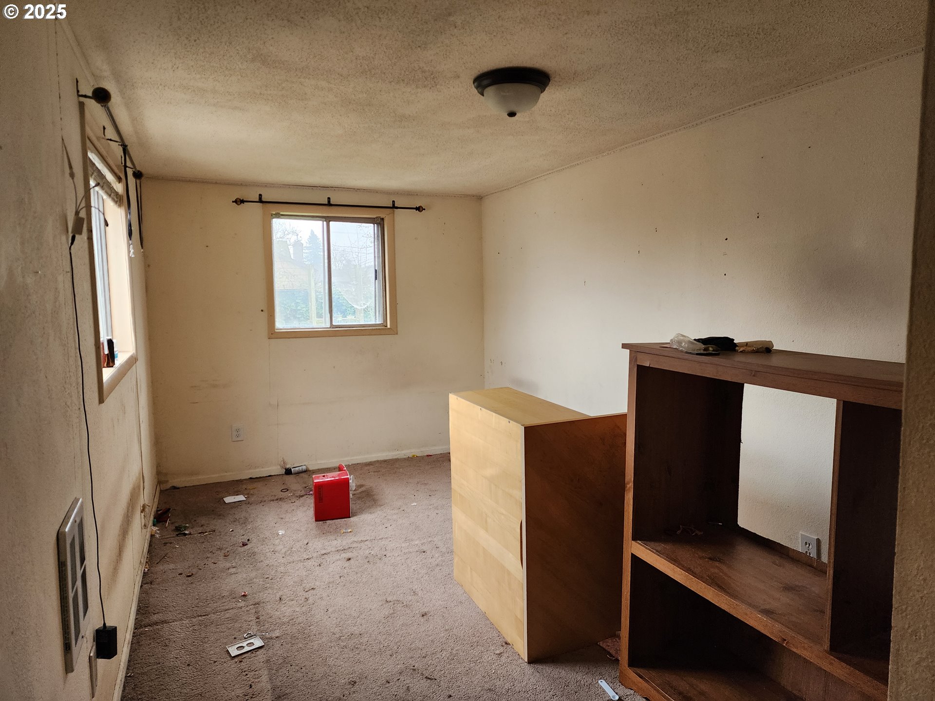 2345 F Street Springfield, OR 97477 - Photo 15 of 20 a living room with furniture and a gate