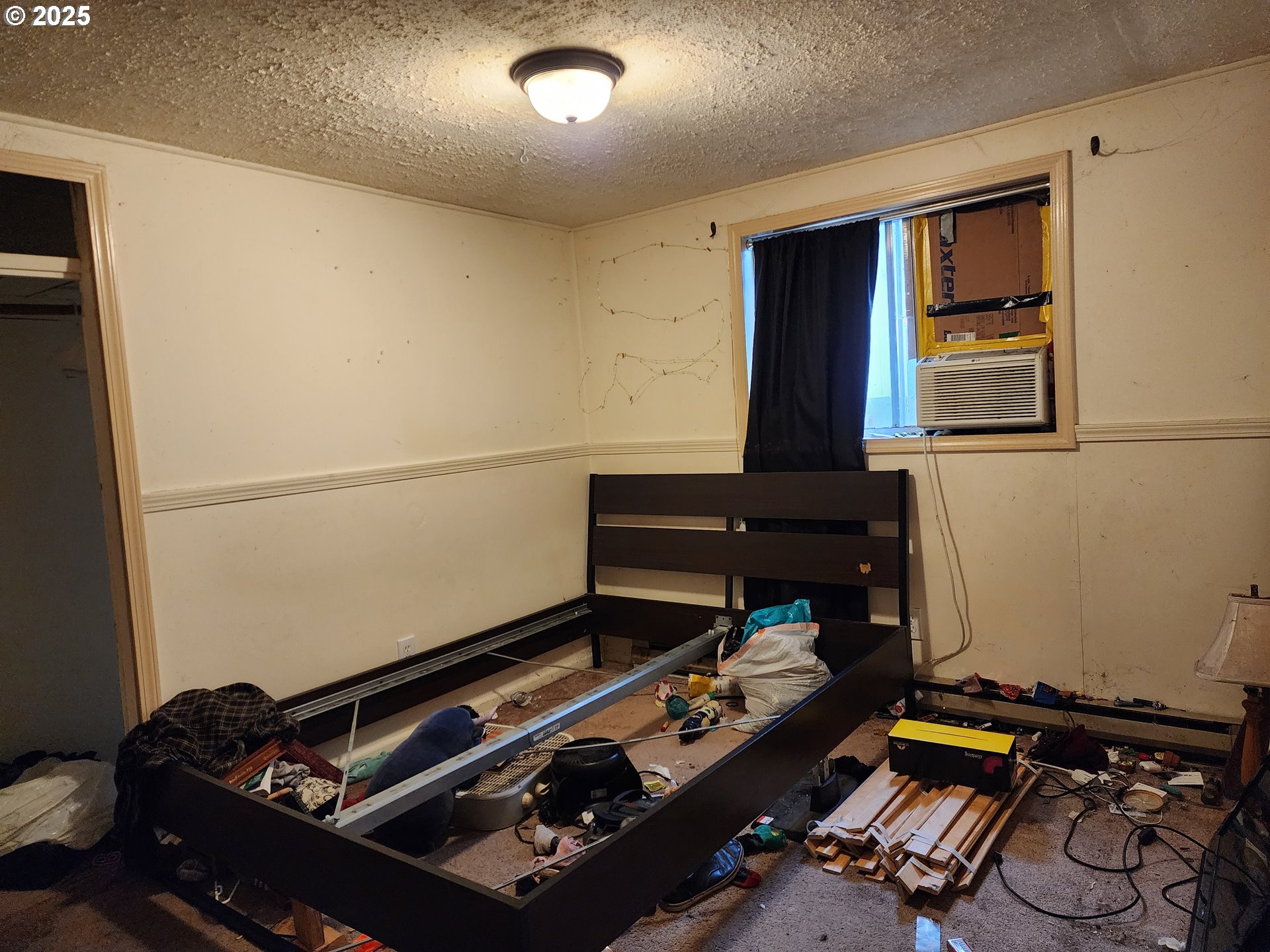 2345 F Street Springfield, OR 97477 - Photo 18 of 20 a room with furniture and wooden floor