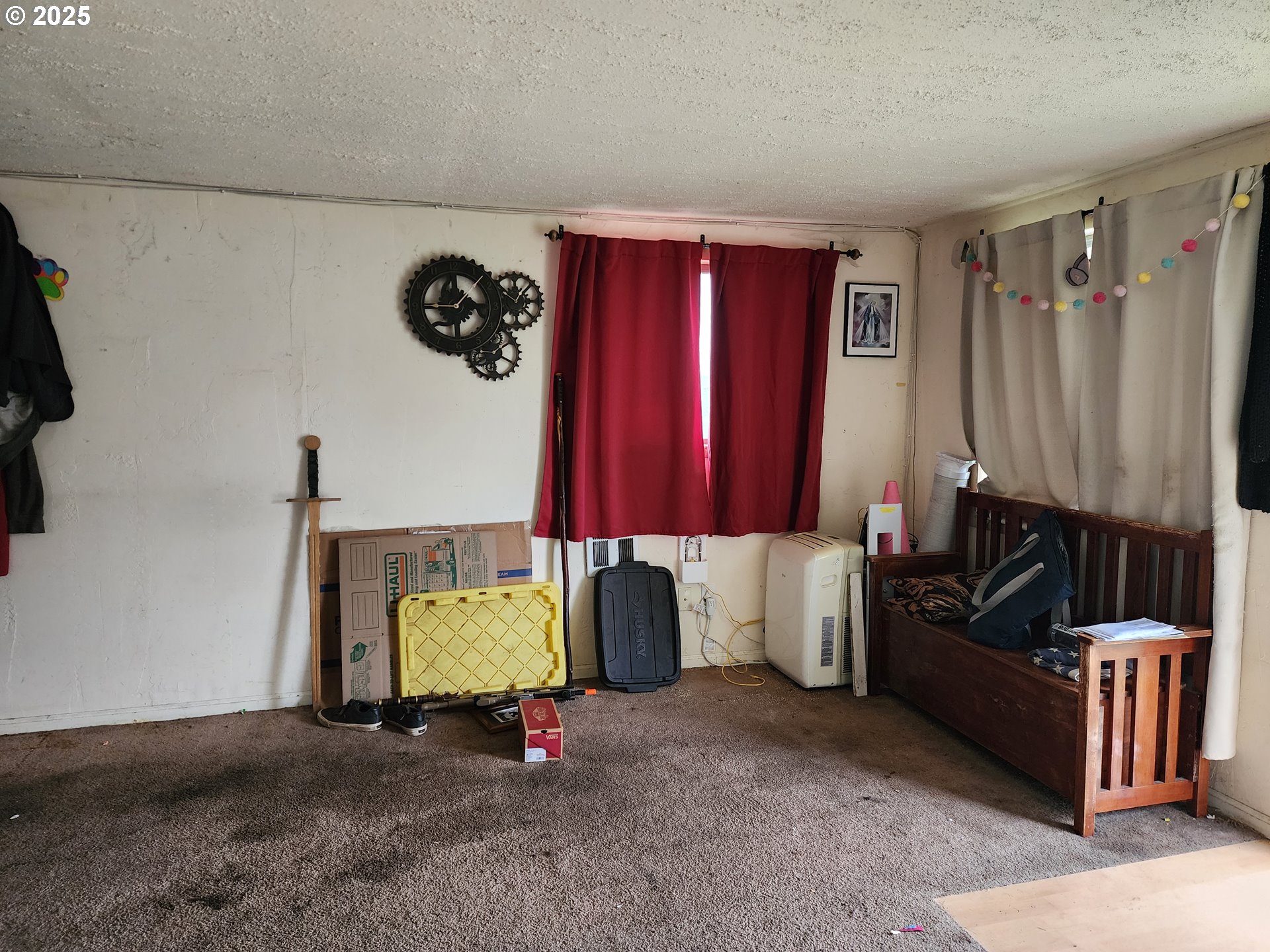 2345 F Street Springfield, OR 97477 - Photo 8 of 20 a living room with furniture and a lamp