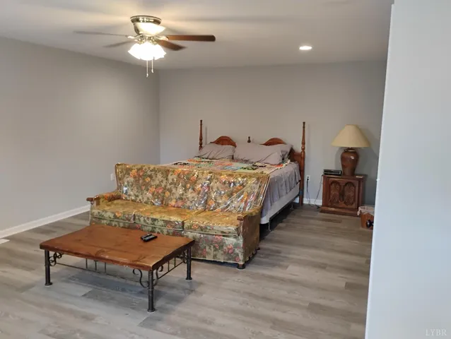 a shelf with books and knick knacks on it