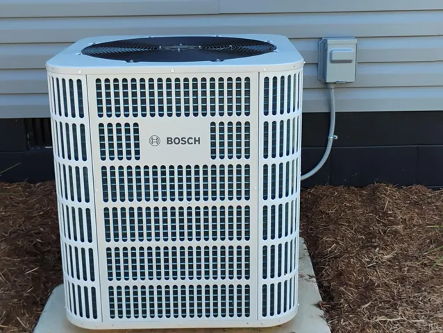 a view of a backyard with sitting area