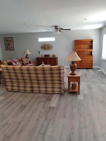 a kitchen with stainless steel appliances a stove microwave and sink